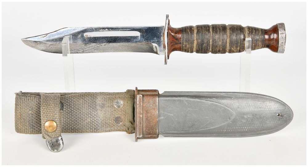 Lot 281: A WWII U.S. Navy Mark 1 Utility Knife by Ka-Bar with NORD Marked Scabbard