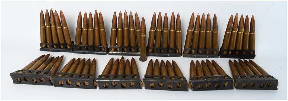 Lot 316: A Lot of 61 Rounds of .303 British Ammunition with Twelve Charger Clips