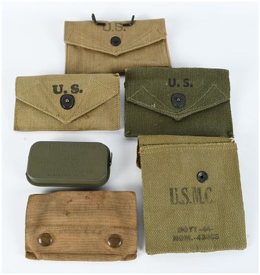 A Group of World War II Era US Army and USMC First Aid Pouches and Carlisle Packet Tin. This 