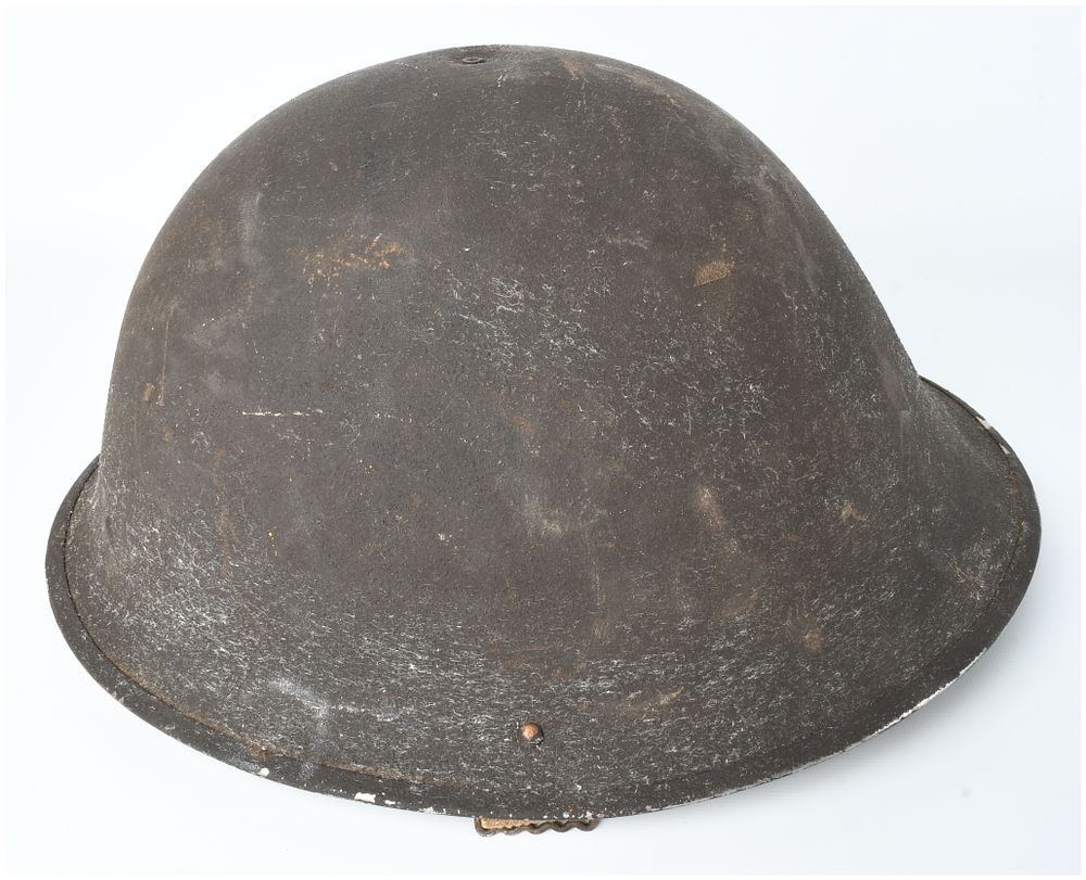 Lot 62: British Military Mk IV Steel Turtle Helmet