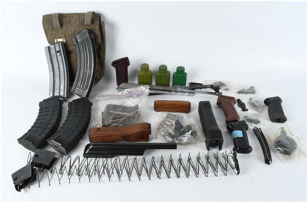 Lot 104: An Assortment of East German DDR Military Surplus and AK-Series Firearm Accessories and Parts