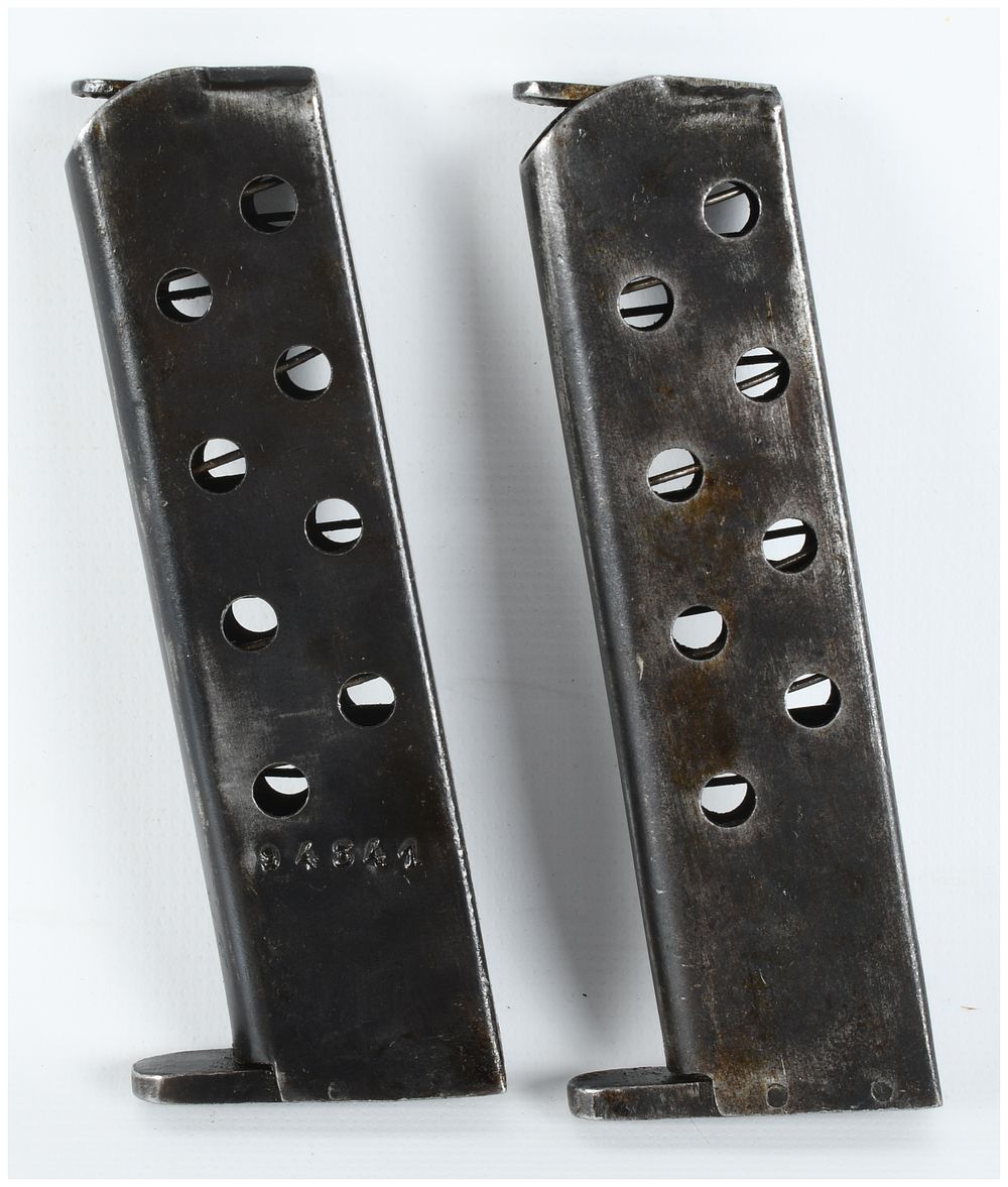 Lot 116: A Pair of Spanish Ruby Pistol Magazines