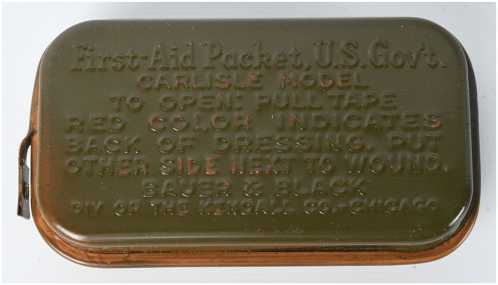 Lot 119: Two WWII US Army Carlisle Model First Aid Packets by Bauer and Black