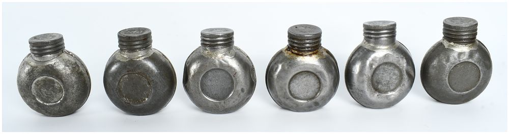 Lot 164: A Collection of 6 Finnish G.W. Sohlberg SA Marked Military Rifle Oil Bottles