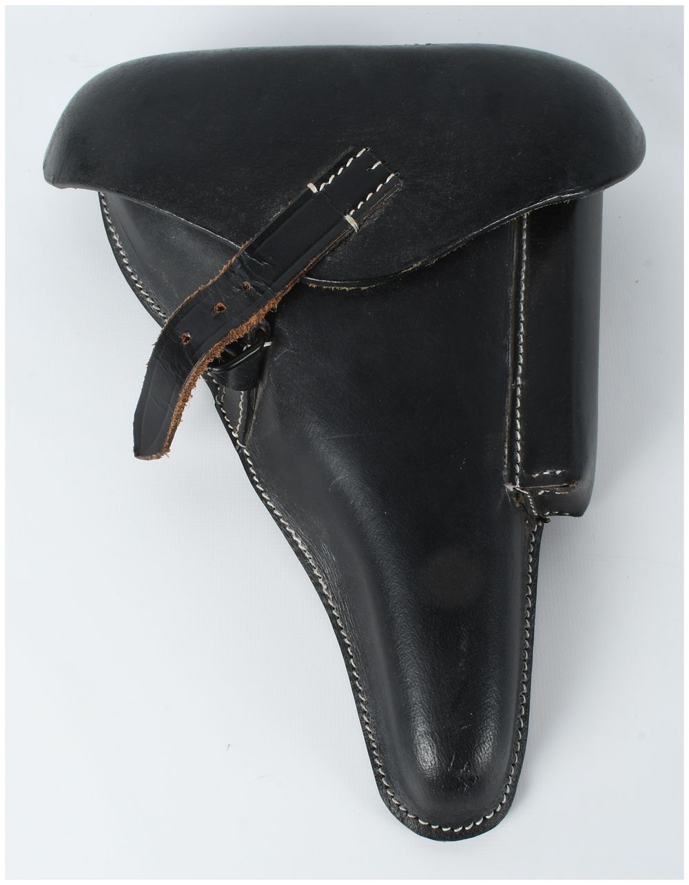 Lot 167: A WWII German P08 Luger Hard Shell Leather Holster by E. G. Leuner GmbH, 1941