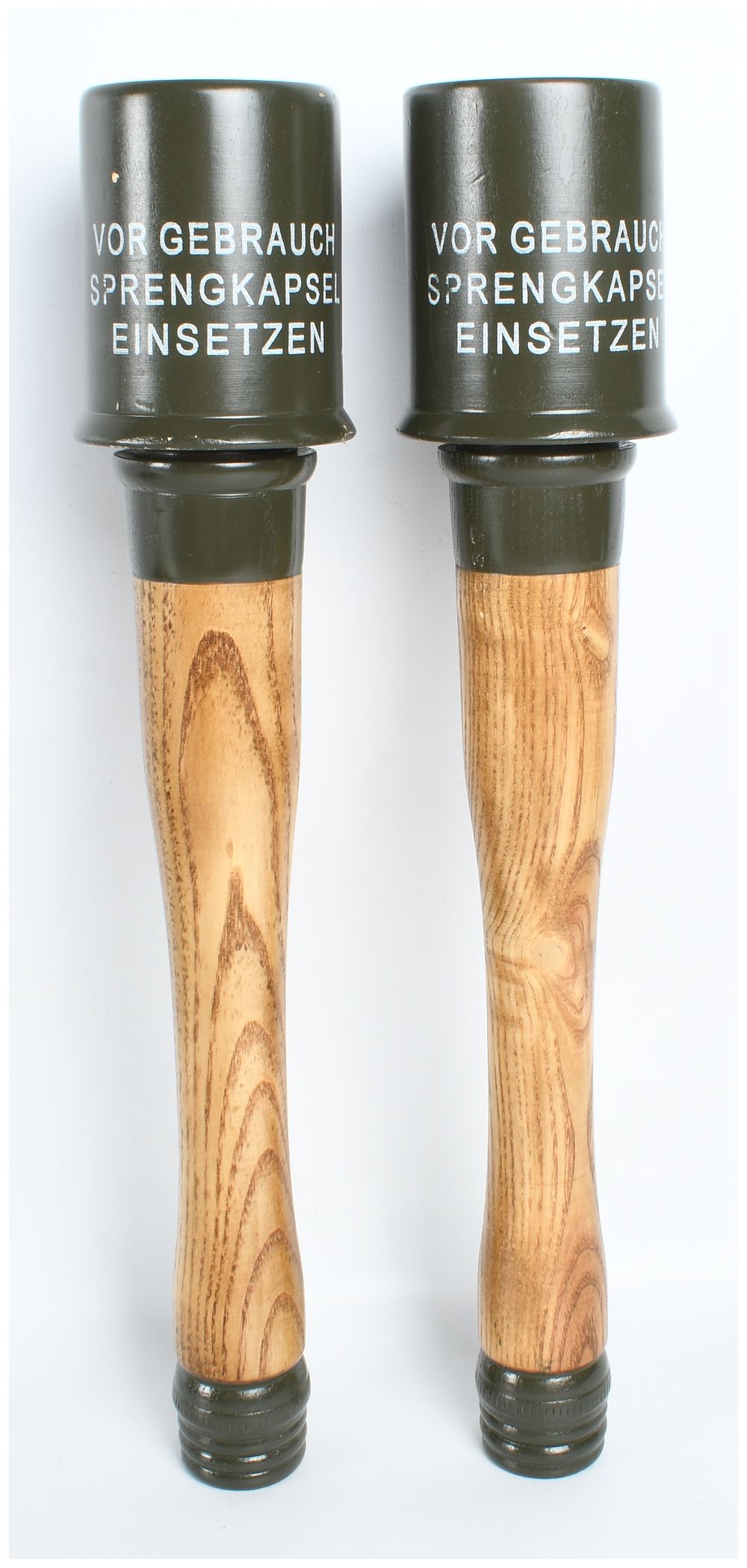 Lot 185: A Pair of Inert Reproduction German WWII M24 Stielhandgranate Stick Grenades