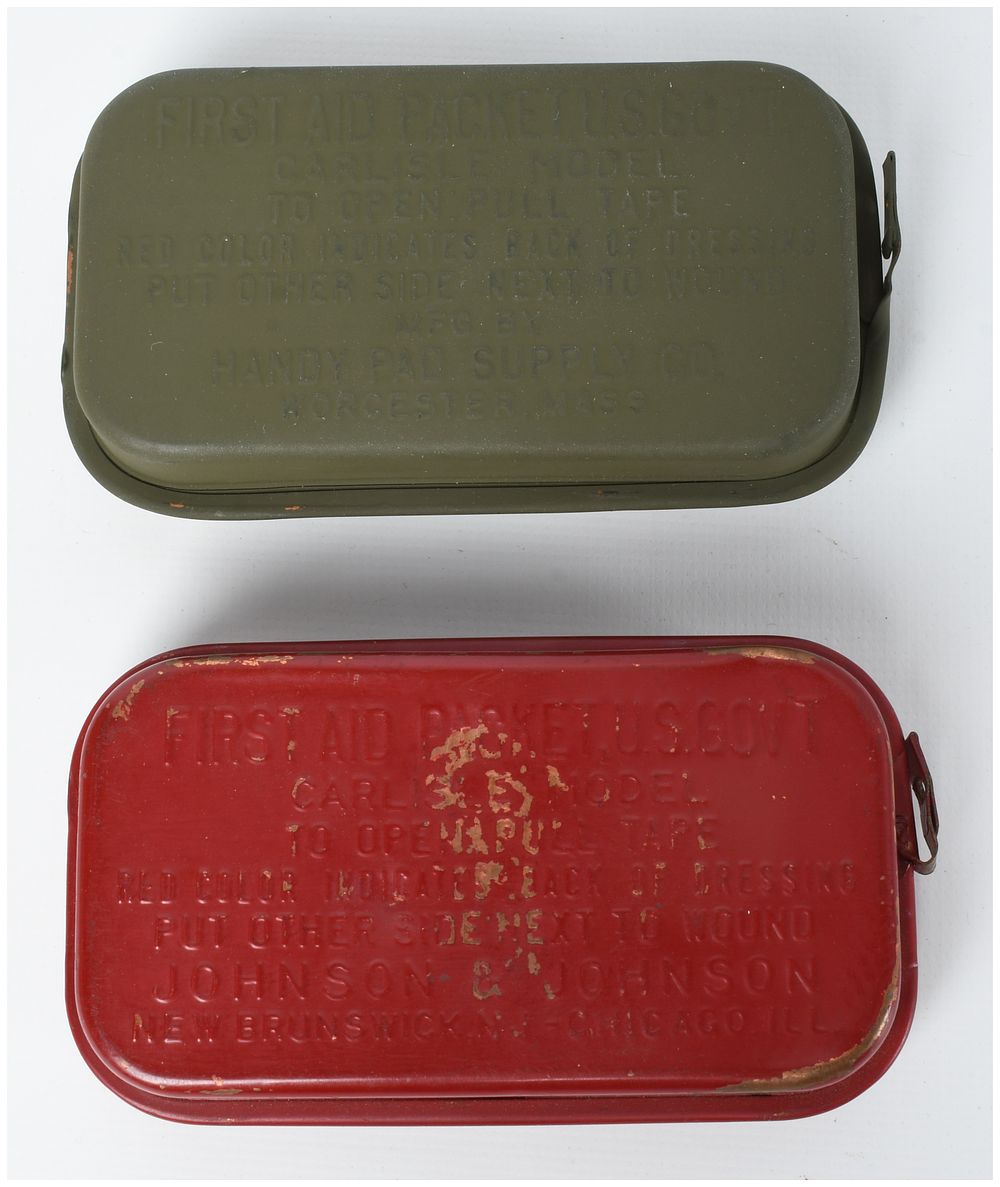 Lot 209: A Pair of WWII US Army Carlisle Model First Aid Packet Tins with Contents