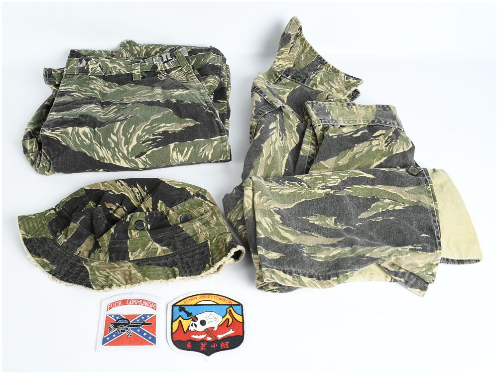 Lot 212: A Collection of Tigerstripe Camouflage Uniform Components and Vietnam War Style Morale Patches