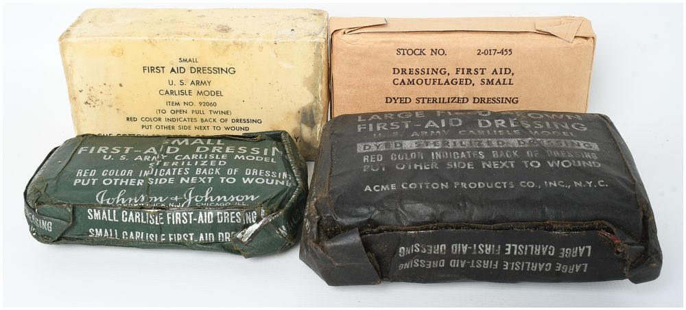 Lot 239: A Collection of Four WWII US Army Carlisle Model First Aid Dressings