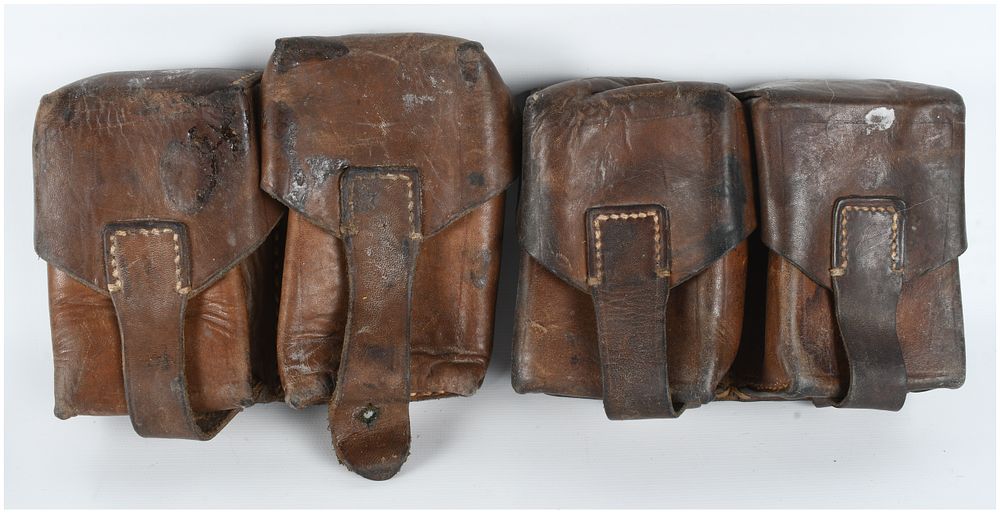 Lot 622: A Pair of Two-Cell Brown Leather Ammunition Pouches for Mauser Pattern Rifles