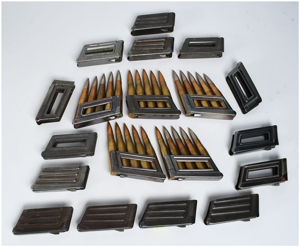 Lot 631: A Lot of 19 Steyr Mannlicher M1895 En Bloc Clips and 25 Rounds of 8x56mmR Ammunition WWII Era