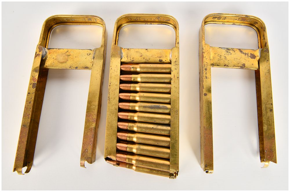 Lot 721: Three Italian Breda Modello 30 Machine Gun Charger Clips with Twenty 6.5mm Rounds