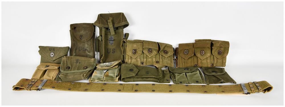 Lot 727: A Group of 9 US Military WWII and Korean War Era Canvas Field Gear Items