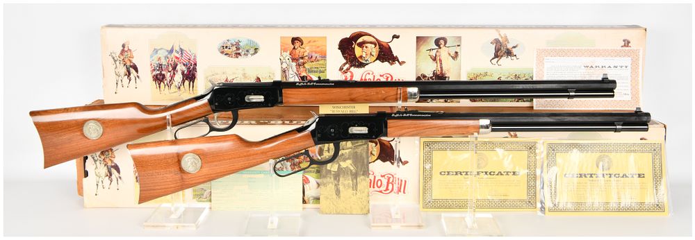 Lot 243: A Pair of Winchester Model 94 Buffalo Bill Commemorative Lever Action Rifle and Carbine .30-30 with 26 and 20 Inch Barrels