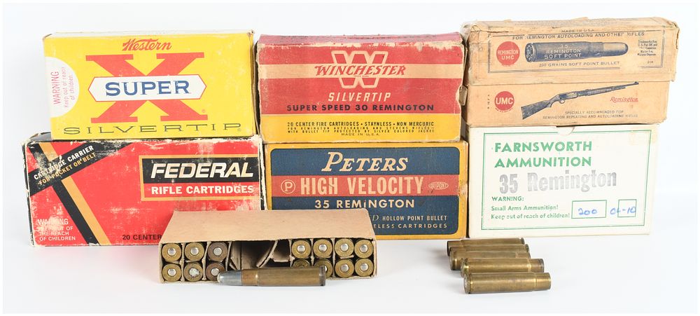Lot 1075: A Lot of 63 Live Rounds and 30 Empty Brass Casings Primarily .35 Remington with 6 Vintage Ammunition Boxes