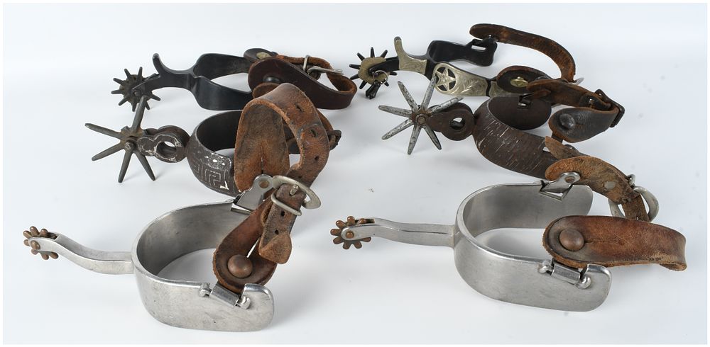 Lot 1319: An Assortment of Western and Mexican Style Cowboy Spurs with Leather Straps