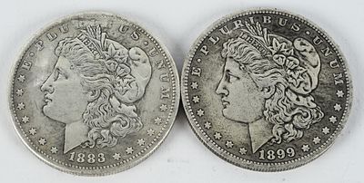 A Pair of US Morgan Silver Dollars, 1883 and 1899-O. A pair of US Morgan Silver Dollars 