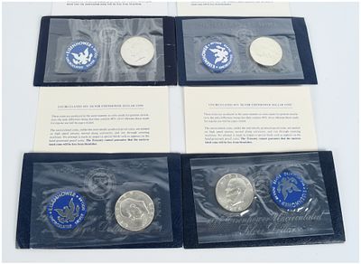 Four US 1971-S to 1974-S Eisenhower 40 Percent Silver Uncirculated Dollars in Government Packaging. 