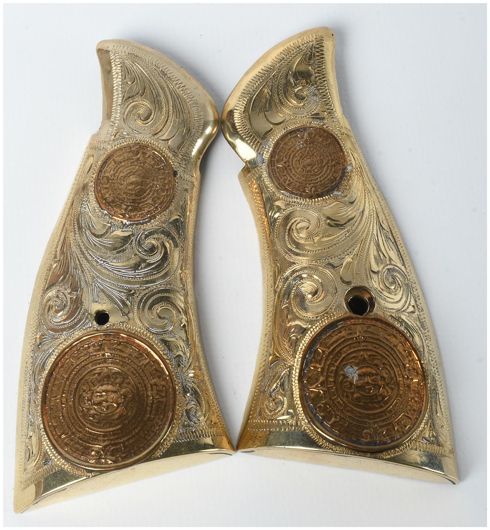 Lot 98: A Pair of Mexican Silver and Gold-Plated S&W K-Frame Square Butt Revolver Grips