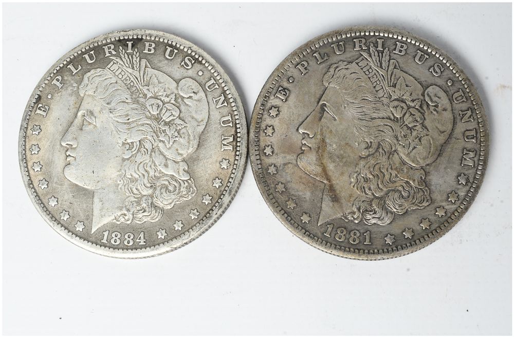 Lot 128: A Pair of US 1881-O and 1884-O Morgan Silver Dollars