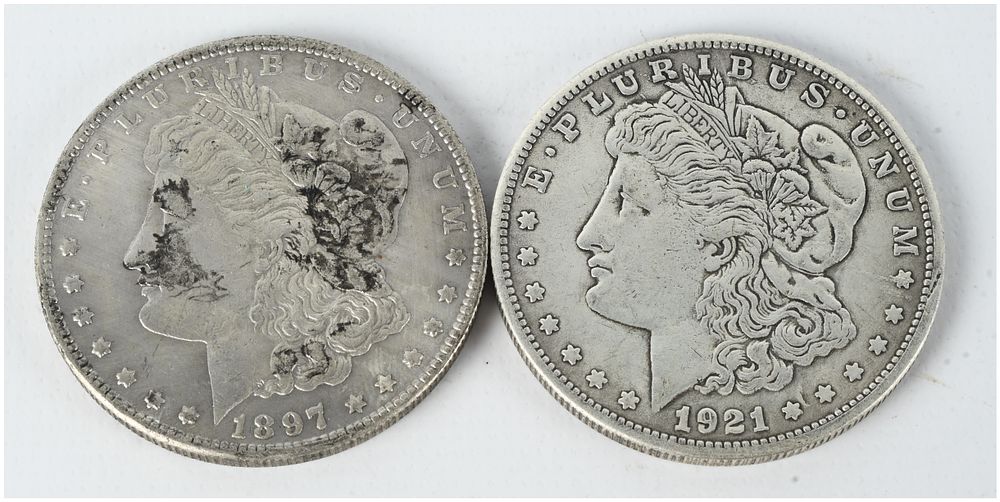 Lot 218: A Pair of US Morgan Silver Dollars, 1921 and 1897 Reproduction