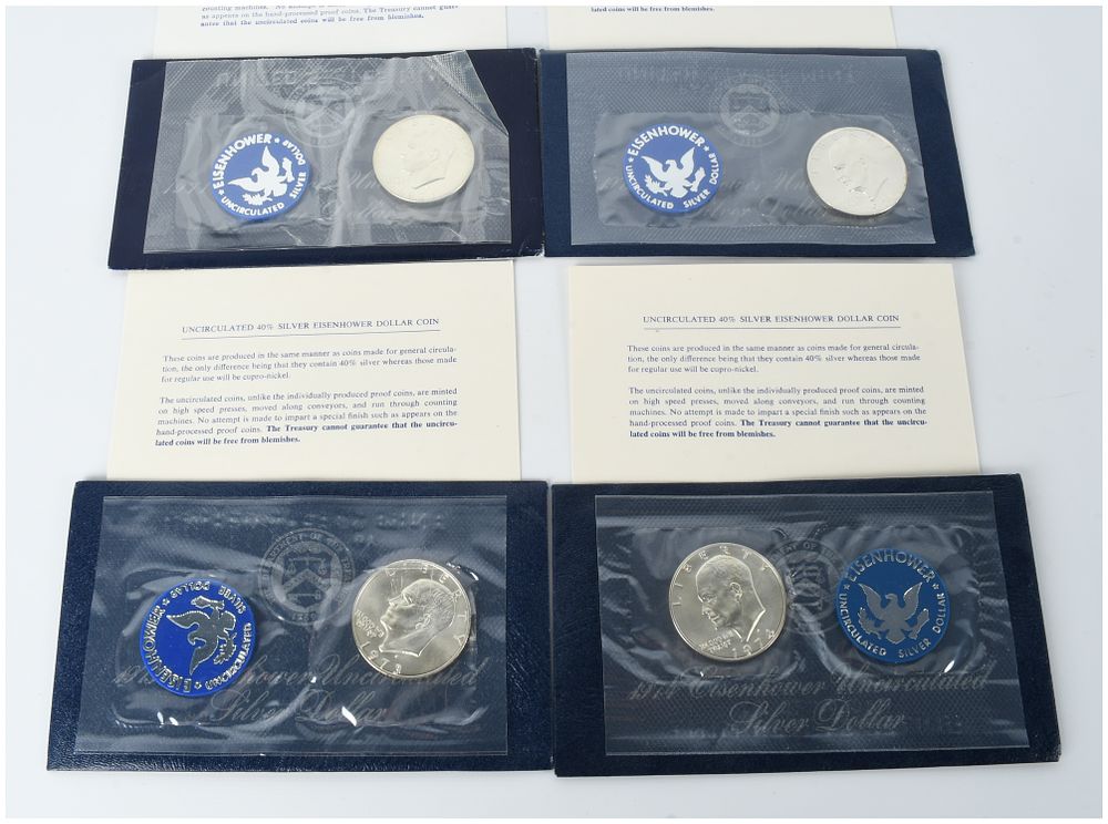 Lot 230: Four 1971-1974-S US Eisenhower 40% Silver Dollar Uncirculated Blue Pack Sets