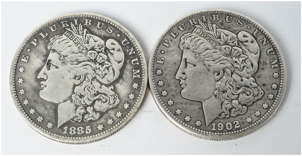 Lot 428: A Pair of US 1885-O and 1902-O Morgan Silver Dollars