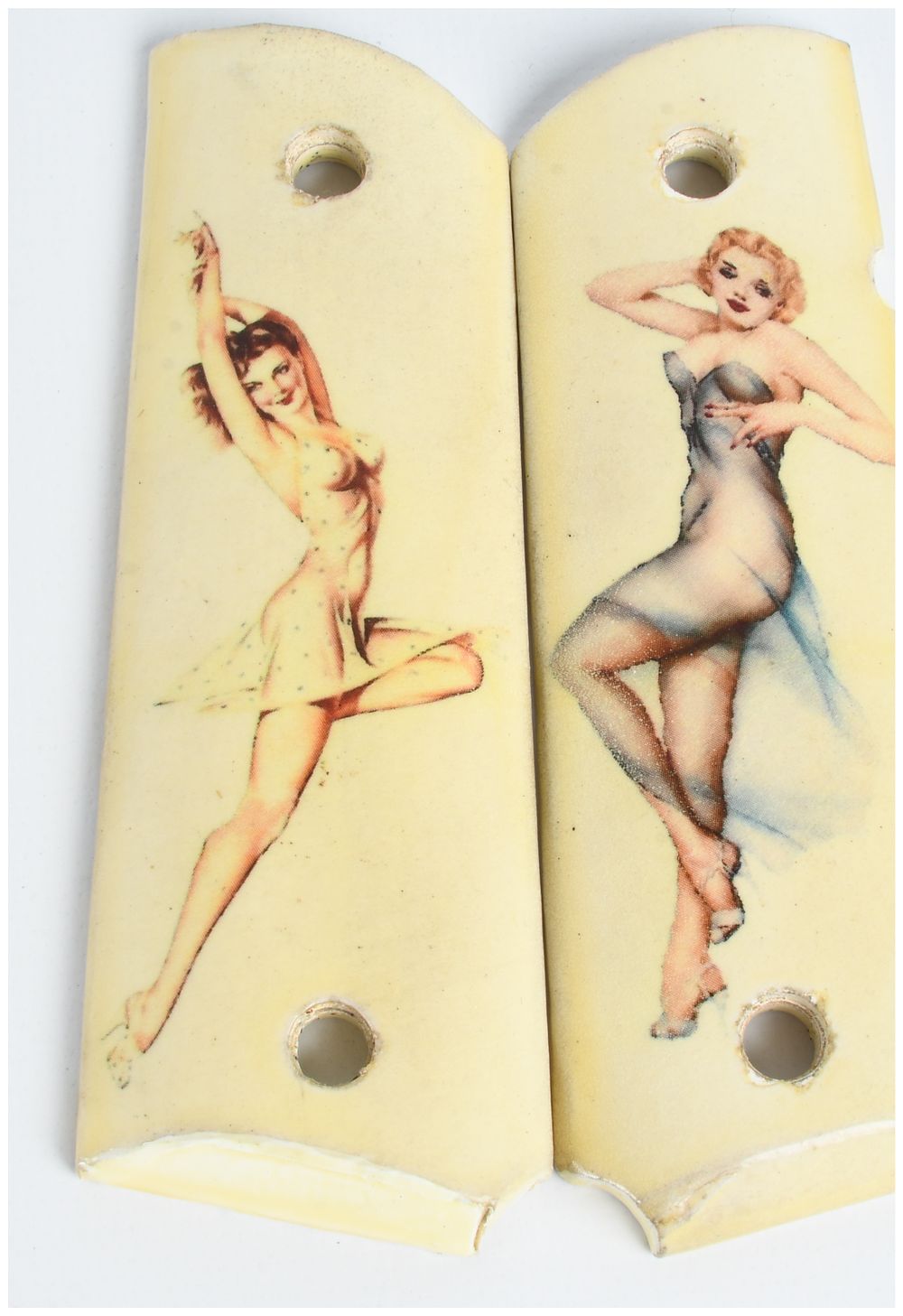 Lot 518: One Pair of 1911-Style Synthetic Ivory Grips with Pin-Up Artwork