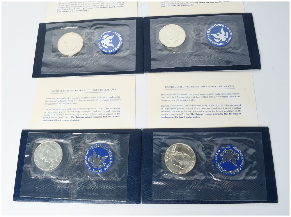 Lot 560: Four US 1972-S Eisenhower 40% Silver Dollar Blue Pack Coins