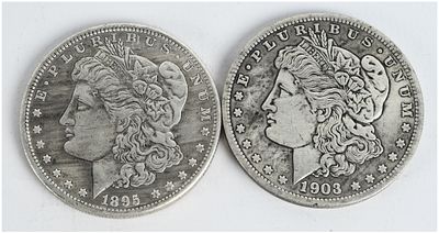 A Pair of US 1895-O and 1903-O Morgan Silver Dollars. A pair of US Morgan Silver Dollars minted 