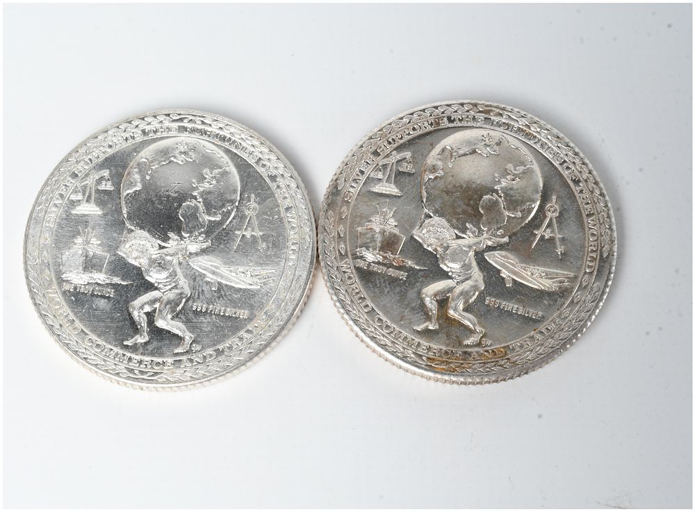Lot 1067: A Pair of .999 Fine Silver 1 Troy Ounce World Commerce Bullion Rounds
