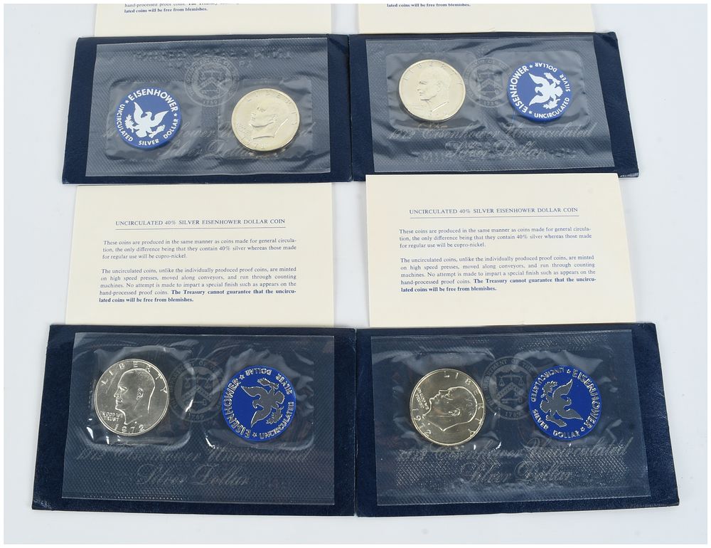 Lot 1289: A Set of Four US 1972-S Eisenhower 40% Silver Dollars, Uncirculated Blue Packs