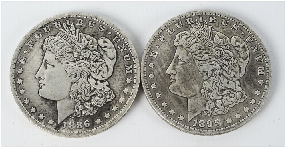Lot 1307: A Pair of US 1886 and 1893 Morgan Silver Dollars