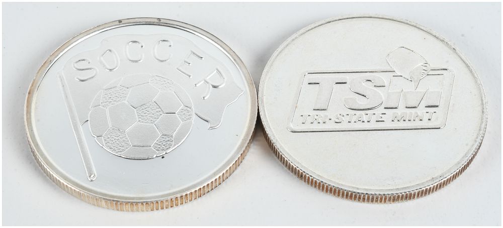Lot 1337: Two 1 oz .999 Fine Silver Rounds including Soccer and Tri-State Mint Designs
