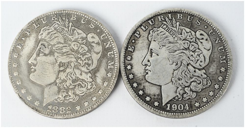 Lot 1397: A Pair of US 1882 and 1904 Morgan Silver Dollars