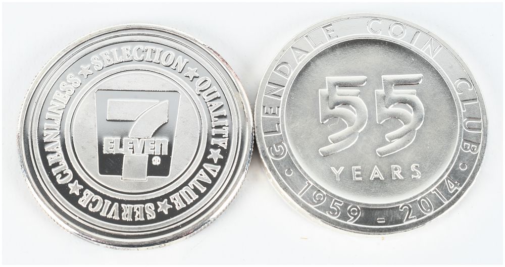 Lot 1487: A Pair of .999 Fine Silver 1 Troy Ounce Bullion Rounds including 7-Eleven Millennium Commemorative