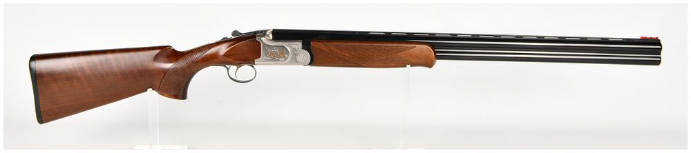 Lot 1548: Mossberg International Silver Reserve Over-And-Under Shotgun 12 Gauge with 28 Inch Barrels