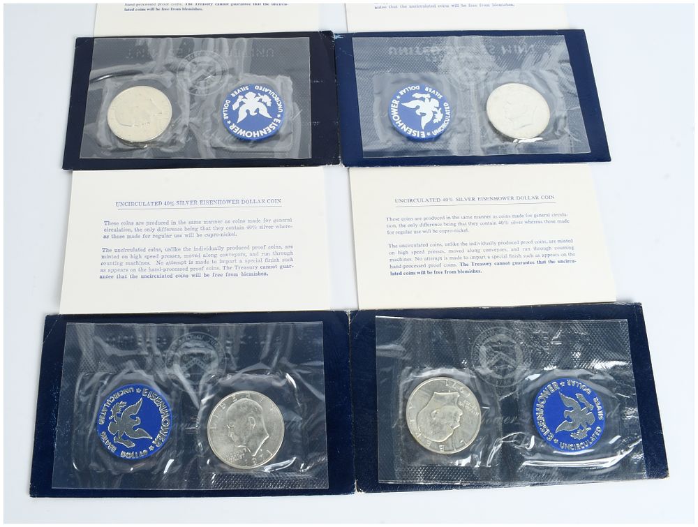 Lot 1559: A Set of Four 1971-S US Eisenhower 40% Silver Dollars, Uncirculated Blue Ike Sets