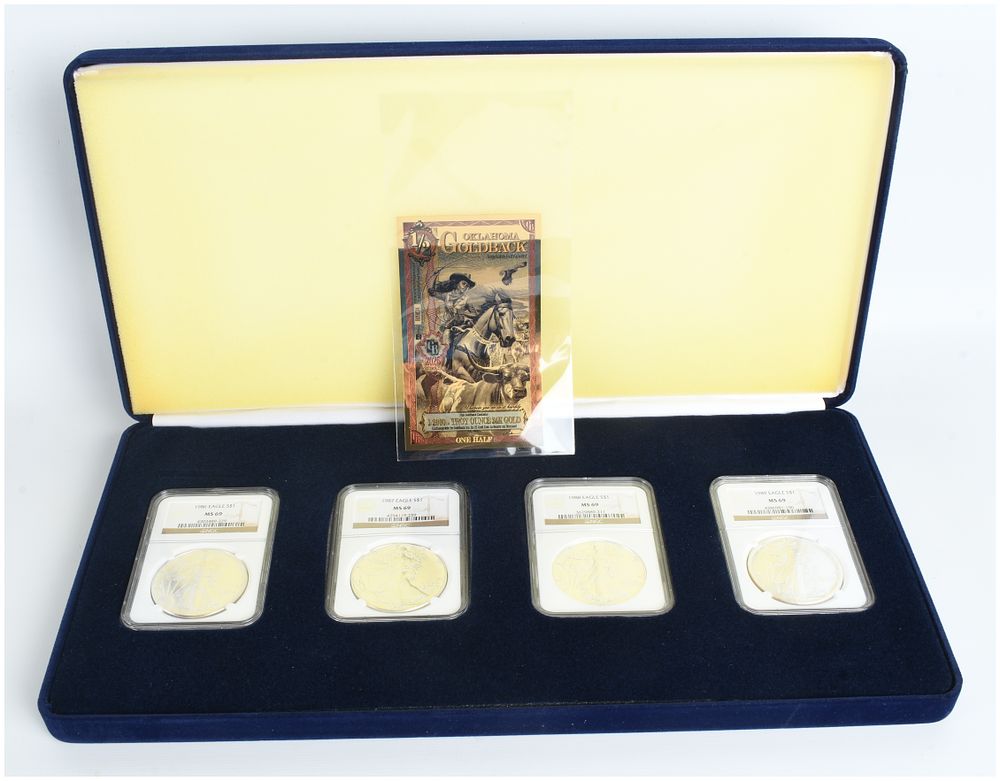 Lot 203: A Set of Graded American Eagle Silver Dollars and an Oklahoma Goldback Gold Foil Note