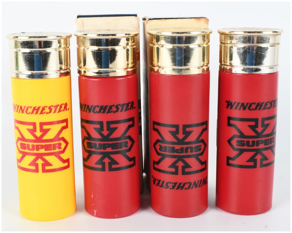 Lot 1502: Set of Four Vintage Avon Good Shot Winchester Super X Shotgun Shell Aftershave Bottles with Boxes