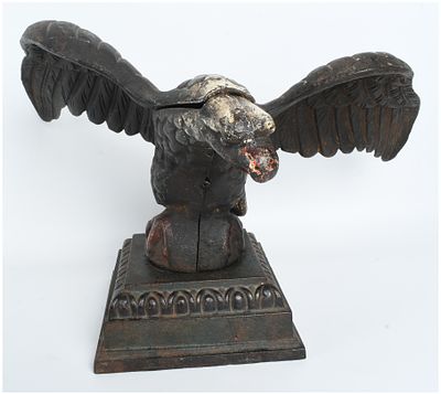 American Painted Cast Iron Eagle Still Bank on Pedestal Base. A cast iron still bank or 