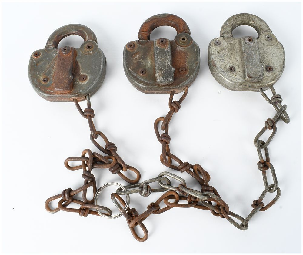 Lot 74: Three Portuguese Cast Iron Railroad Style Padlocks with Interconnected Chains and Central Ring