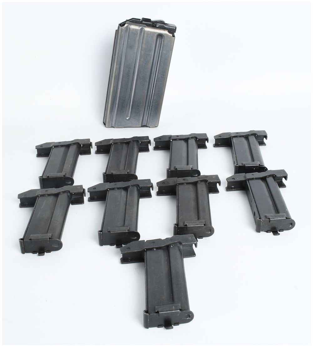 Lot 107: A Collection of Ten M16/M16A1 Magazines and .22 LR Conversion Clips including Simmonds Precision Products