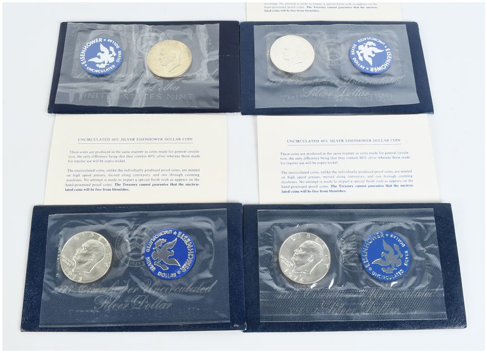 Lot 1049: A Set of 4 US 1971-S to 1974-S Eisenhower Uncirculated 40% Silver Dollars in OGP