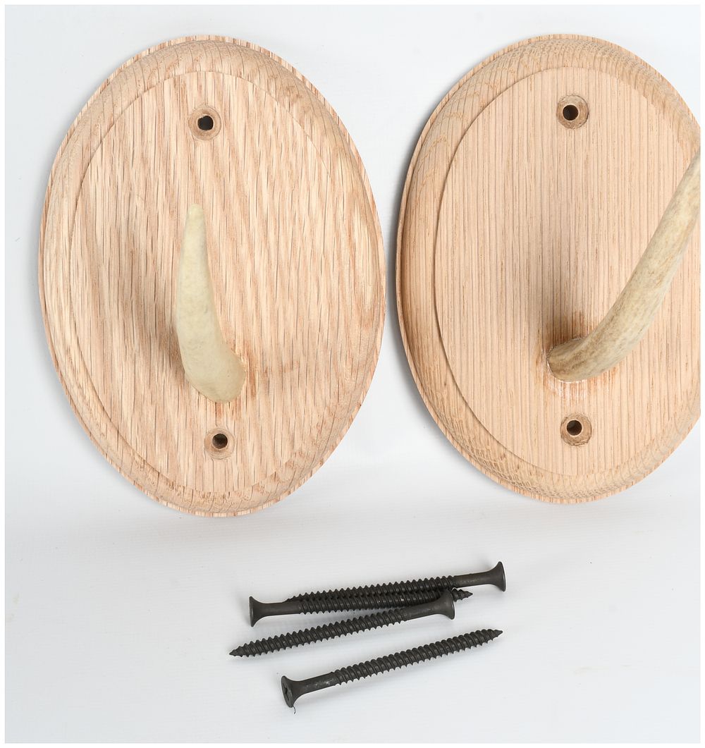 Lot 1133: A Pair of John G. Zimmerman Oak and Antler Wall Hooks