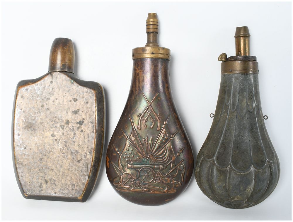 Lot 1343: Three Mid-19th Century Powder Flasks including Patriotic Stand of Arms and Fluted Shell Designs