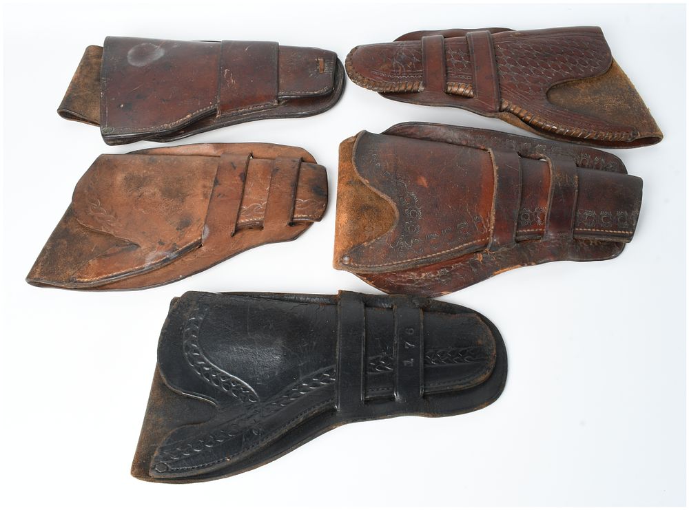 Lot 1376: A Collection of 5 Double Loop Tooled Leather Single Action Revolver Holsters Antique