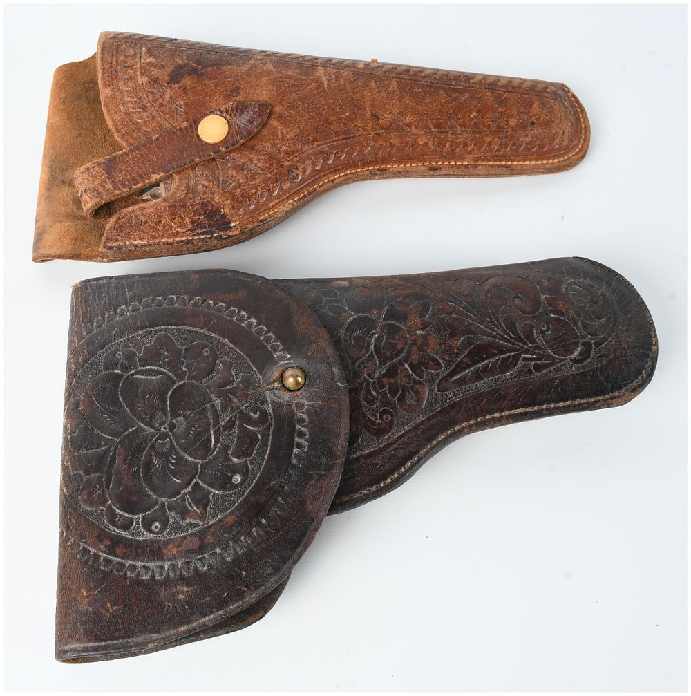 Lot 1436: A Pair of Tooled Leather Pistol Holsters including an H.H. Heiser Model 745