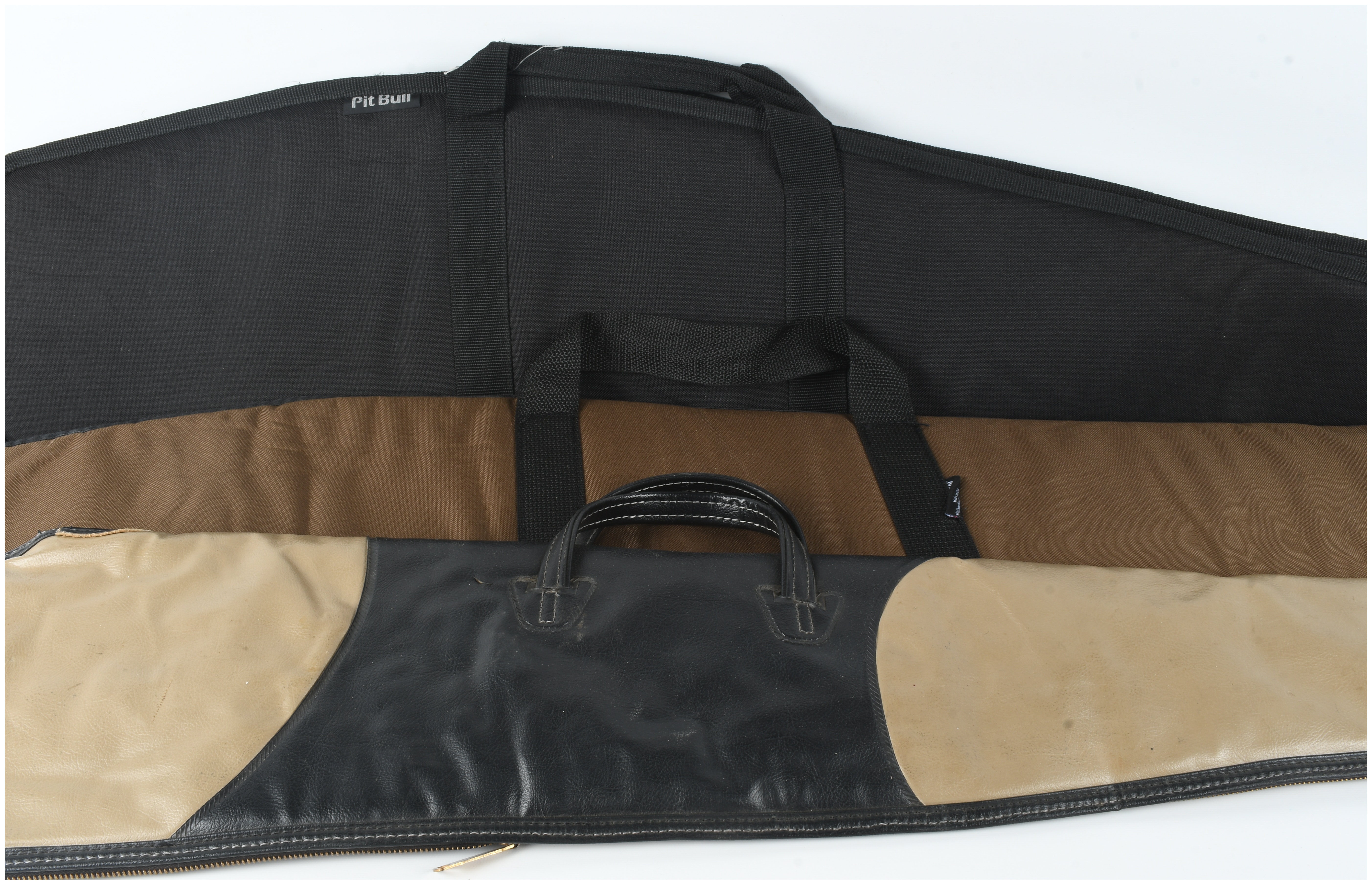 A Collection of 3 Gun Cases and Slips Including Plano and Boyt Models