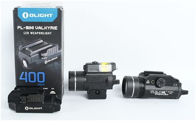 A Trio of Tactical Weapon Lights Including Olight PL-Mini Valkyrie, Streamlight TLR-4, and 
